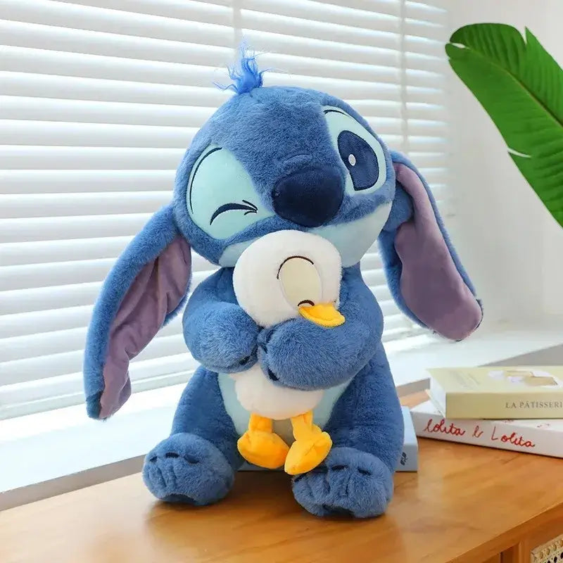 Disney Stitch plush doll hugging duck on shelf