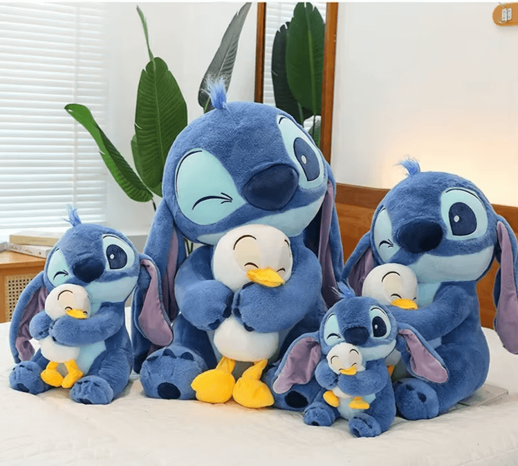 Collection of Disney Stitch plush dolls with ducks